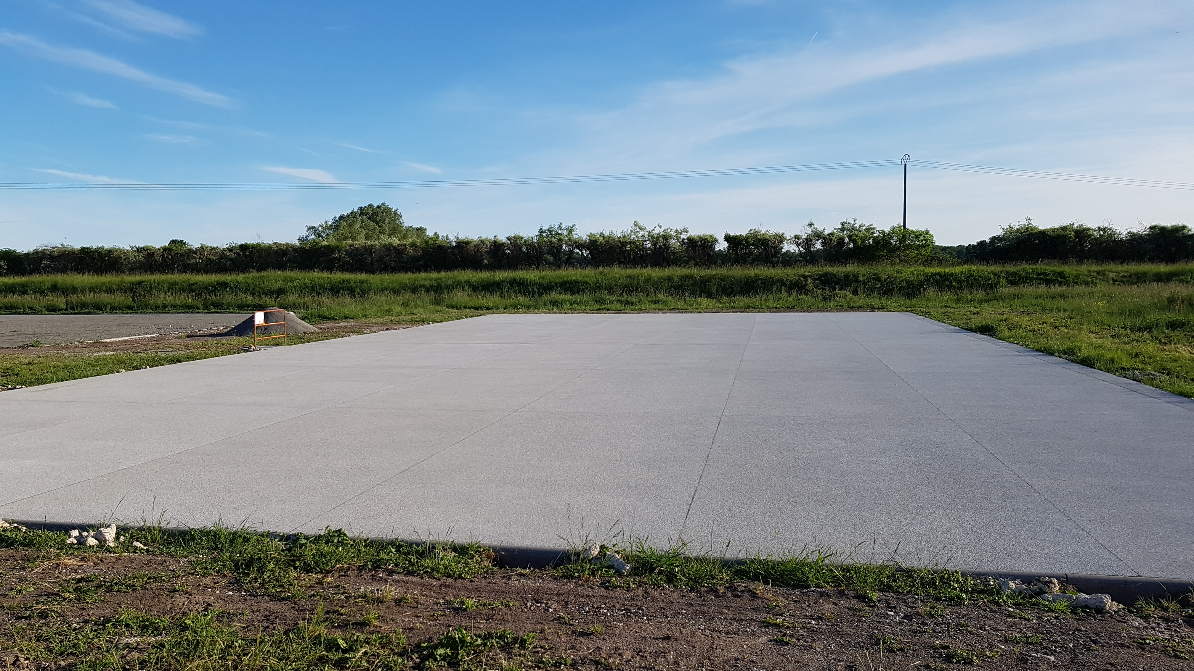 court de tennis en béton poreux
